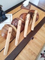 Four completed toy tops Hawaiian Woods.jpg
