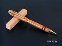 Slimline Cobalt Gold Twist Pen - Some Wood from Backyard with Bloodwood Bands.jpg