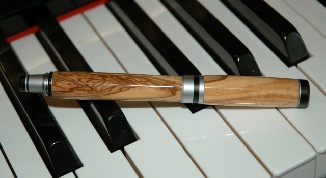 20054413225_Olivewood%20on%20piano.jpg