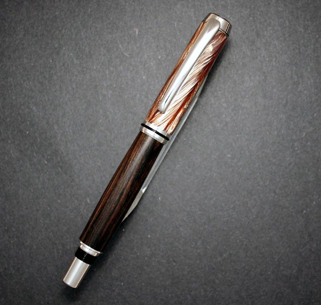 20062112846_FeatherAndAfricanBlackwood.jpg