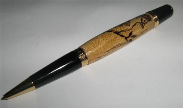 2007121611149_umbrella%20bird%20pyrography.jpg