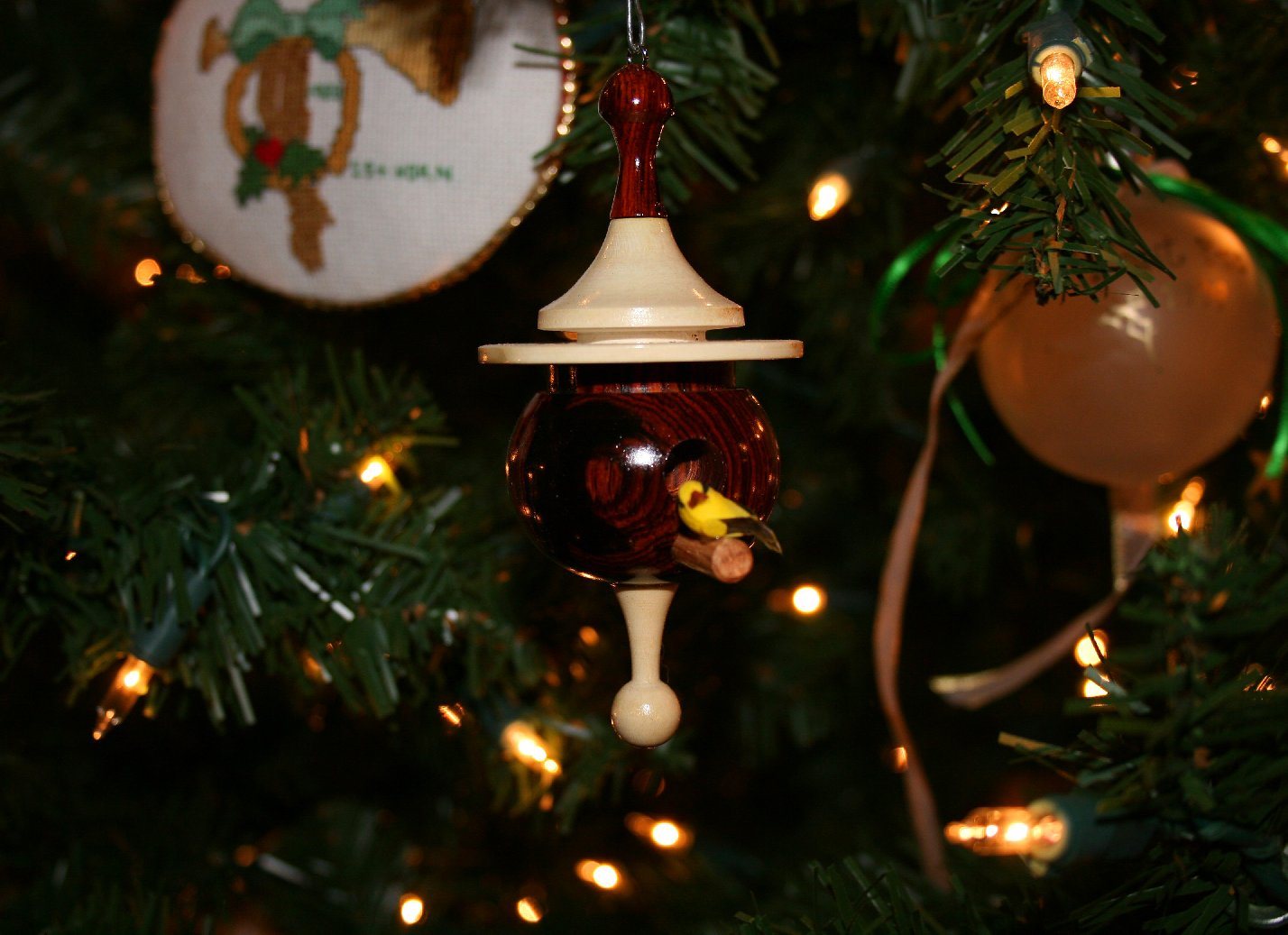 obolo%20-%20holly%20ornament%20on%20tree%20resized.jpg