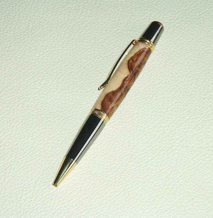 sierra%20blk%20tn%20and%20gold%20in%20maple%20burl.jpg