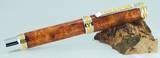 tn_emperor_amboyna%20burl_ca%20finish_cap%20on.jpg