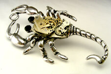 steampunk_scorpion_pendant_watch_movement_by_polasian-d66q6d1.jpg