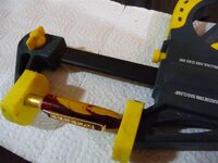 23 hold clip holder and cap in place in a vice.jpg