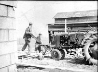 Dad Charles and Tractor.jpg
