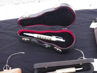 Holly w Piano Keyys embedded inside Guitar Case.jpg
