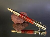 Red pine cone bolt action.jpg