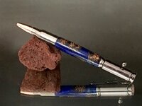 Blue pine cone bolt action.jpg