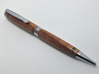 Trimline in chrome and turquoise inlyed Hawaiian Koa wood.JPG