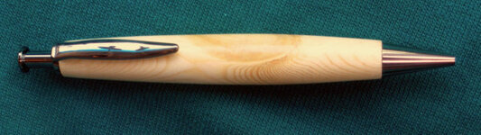 Knotty Pine Clicker side c-2.jpg