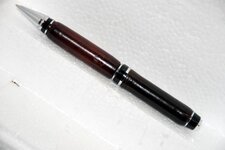 Pesn - 4-9-11 Leather and leather chrome cigar.jpg