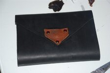 Journal - 5-14-10 Tri Fold Black, Magnet catch fish symbol.jpg