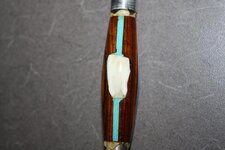 Koa with Elk tooth.jpg