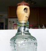 BIRDHOUSE BOTTLE STOPPER IN ANTIQUE BOTTLE. 8-8-2012 4-07-20 PM.jpg