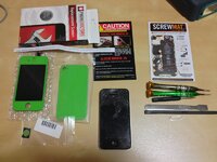 Repair kit and broken iPhone.jpg