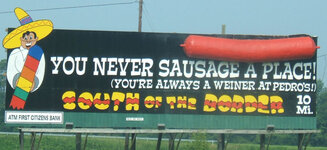 800px-south_of_the_border_sign_10_-_you_never_sausage_a_place.jpg