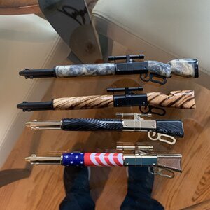 Lever action pens