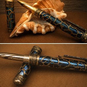 Ballpoint pen made of brass, titanium and mokume gane.