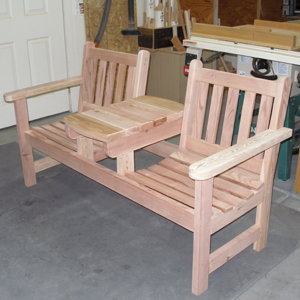 Two seater bench in Redwood.