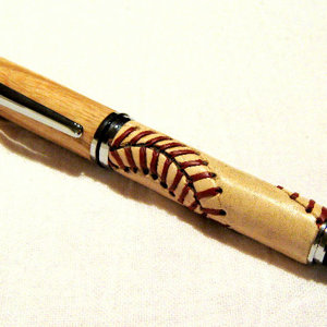 Baseball grip with ash cap