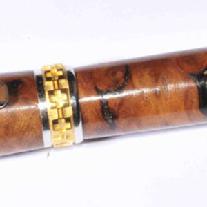 Emperor in redwood, maple, and ironwood