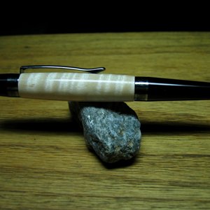 004: curly maple sienna black titanium