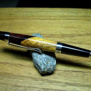 005: cocobolo burl sienna rhodium