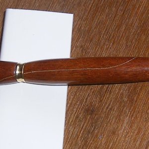 Thick mahogany pen with brass inlay and home turned brass furniture I