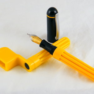 String-winder pen