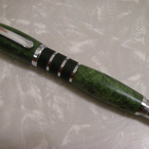 Guardian in Green Buckeye Burl with cap on