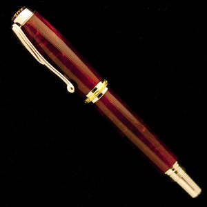 Jr Statesman in Golden Ruby Polyresin
