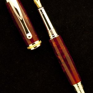 Jr Statesman in Golden Ruby Polyresin