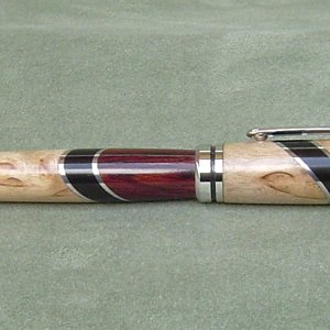 Cocobolo, Ebony, Masur Birch and Aluminum