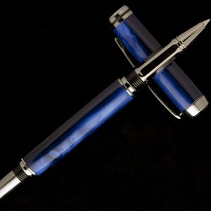 Royal Blue Madreperlato on Black Titanium Navigator