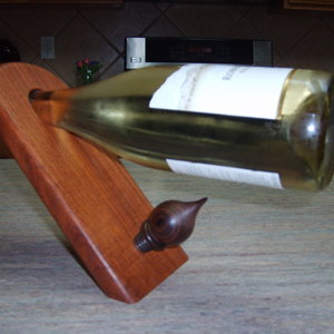 wine bottle holder with stopper