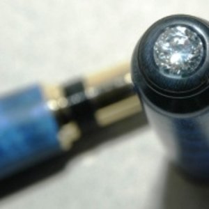 Top Closed-end Baron with Lab Created Faceted Diamond