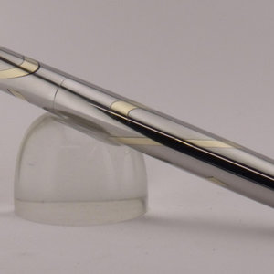 Brass feathers in steel