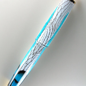 Longtube Click with Marla's Feathers