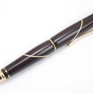 Modified cigar pen with blackwood and brass inlay