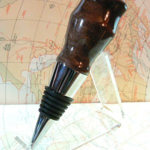Chrome bottle stopper with walnut