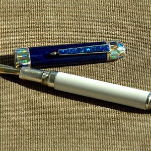 Sterling silver pen with opal inlays