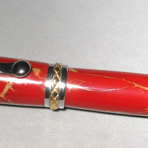 Triton FP in Red with Gold matrix tru-stone