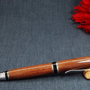 Cigar style twist pen with Black Walnut body and Rhodium parts