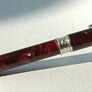 burgundy pr with silver snake