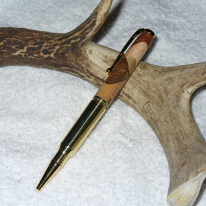 XXX-.308 cartridge and multiple compressed woods