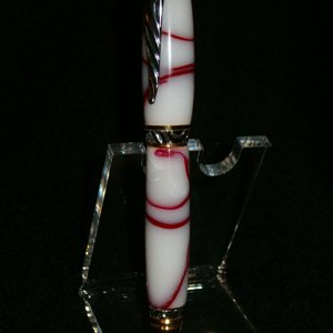 fancy cigar home casting with red ribbon