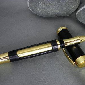 22ct gold & black aluminium