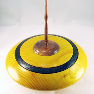 Hollow vessel in Ossage Orange and walnut lid